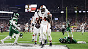 Dec 28, 2023; Cleveland, Ohio, USA; Cleveland Browns running back Jerome Ford (34) scores a touchdown during the first half against the New York Jets at Cleveland Browns Stadium. Mandatory Credit: Scott Galvin-Imagn Images