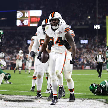 Dec 28, 2023; Cleveland, Ohio, USA; Cleveland Browns running back Jerome Ford (34) scores a touchdown during the first half against the New York Jets at Cleveland Browns Stadium. Mandatory Credit: Scott Galvin-Imagn Images