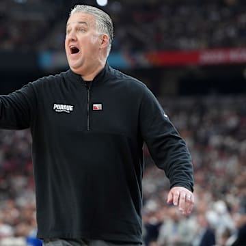Purdue Boilermakers head coach Matt Painter talks to players 