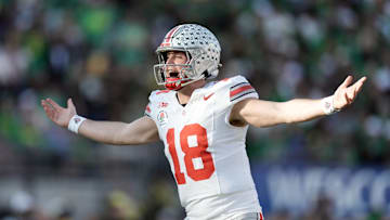 Jan 1, 2025; Pasadena, CA, USA; Ohio State Buckeyes quarterback Will Howard (18) celebrates in the second quarter against the Oregon Ducks in the 2025 Rose Bowl college football quarterfinal game at Rose Bowl Stadium. Mandatory Credit: Kirby Lee-Imagn Images