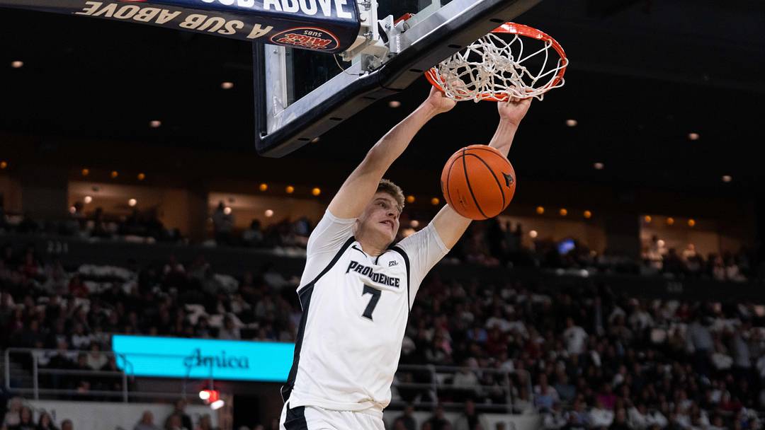 Feb 14, 2026; Providence, Rhode Island, USA; Providence College Friars guard Stefan Vaaks (7) dunks during the first half of the game against the St. John’s University Red Storm at Amica Mutual Pavilion. Mandatory Credit: Natalie Reid-Imagn Images