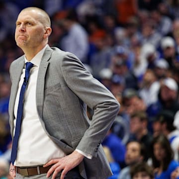 Mar 1, 2025; Lexington, Kentucky, USA; Kentucky Wildcats head coach Mark Pope looks on during the first half against the Auburn Tigers at Rupp Arena at Central Bank Center. Mandatory Credit: Jordan Prather-Imagn Images