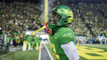 Nov 24, 2023; Eugene, Oregon, USA; Oregon Ducks defensive back Dontae Manning (8) celebrates after intercepting a pass in the end zone during the second half against the Oregon State Beavers at Autzen Stadium.