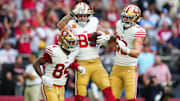 Nov 16, 2025; Glendale, Arizona, USA; San Francisco 49ers tight end George Kittle (85) celebrates scoring a touchdown with tight end Jake Tonges (88) and wide receiver Kendrick Bourne (84) in the first quarter against the Arizona Cardinals at State Farm Stadium. Mandatory Credit: Joe Camporeale-Imagn Images