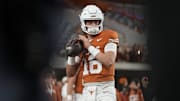 Texas Longhorns quarterback Arch Manning (16) warms up before a game against the Texas A&M Aggies, Nov. 28, 2025 at Darrell K Royal-Texas Memorial Stadium in Austin, Texas.