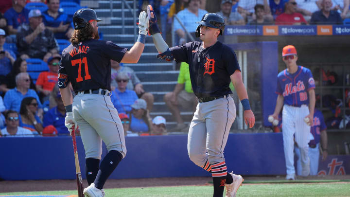 Mar 10, 2024; Port St. Lucie, Florida, USA;  Detroit Tigers second baseman Jace Jung (84) is congratulated by first baseman Ryan Vilade (71) for scoring a run in the eighth inning against the New York Mets at Clover Park. 