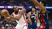 Nov 19, 2025; Cleveland, Ohio, USA; Houston Rockets forward Kevin Durant (7) looks to pass while being defended by Cleveland Cavaliers forwards Nae’ Qwan Tomlin (35) and De'Andre Hunter during the first half at Rocket Arena. Mandatory Credit: David Dermer-Imagn Images