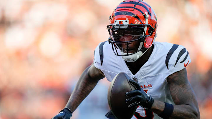 Cincinnati Bengals wide receiver Tee Higgins (5) runs in for a touchdown in the first quarter of the NFL Preseason Week 1 game between the Cincinnati Bengals and the Tampa Bay Buccaneers at Paycor Stadium in downtown Cincinnati on Saturday, Aug. 10, 2024.