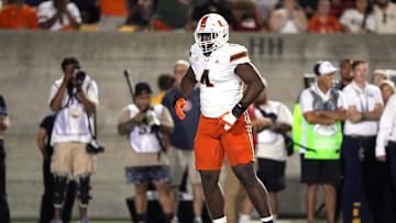 Oct 5, 2024; Berkeley, California, USA; Miami Hurricanes defensive lineman Rueben Bain Jr. (4) reacts after a tackle against the California Golden Bears during the first quarter at California Memorial Stadium. Mandatory Credit: Darren Yamashita-Imagn Images