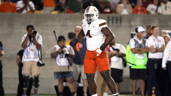 Oct 5, 2024; Berkeley, California, USA; Miami Hurricanes defensive lineman Rueben Bain Jr. (4) reacts after a tackle against the California Golden Bears during the first quarter at California Memorial Stadium. Mandatory Credit: Darren Yamashita-Imagn Images