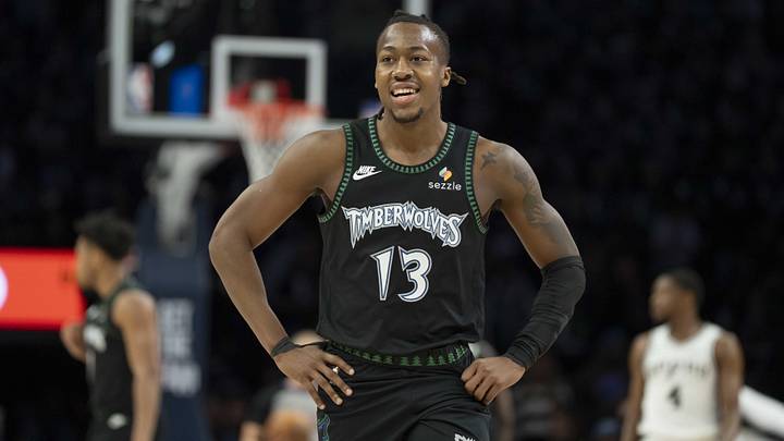 May 8, 2026; Minneapolis, Minnesota, USA; Minnesota Timberwolves guard Ayo Dosunmu (13) against the San Antonio Spurs in the first half during game three of the second round of the 2026 NBA Playoffs at Target Center. Mandatory Credit: Jesse Johnson-Imagn Images