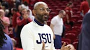 Nov 21, 2025; Fayetteville, Arkansas, USA; Jackson State Tigers head coach Mo Williams congratulates Arkansas Razorbacks players after the game at Bud Walton Arena. Arkansas won 115-61. Mandatory Credit: Nelson Chenault-Imagn Images
