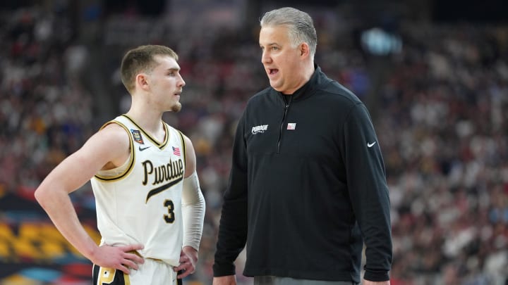 Purdue Boilermakers guard Braden Smith (3) talks with coach Matt Painter during the the men's Final Four of the 2024 NCAA Tournament at State Farm Stadium. 