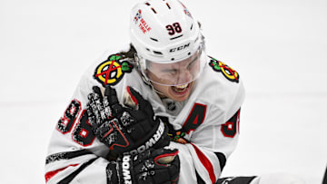 Dec 12, 2025; St. Louis, Missouri, USA; Chicago Blackhawks center Connor Bedard (98) reacts in pain after a face off against St. Louis Blues center Brayden Schenn (not pictured) during the third period at Enterprise Center. Mandatory Credit: Jeff Curry-Imagn Images