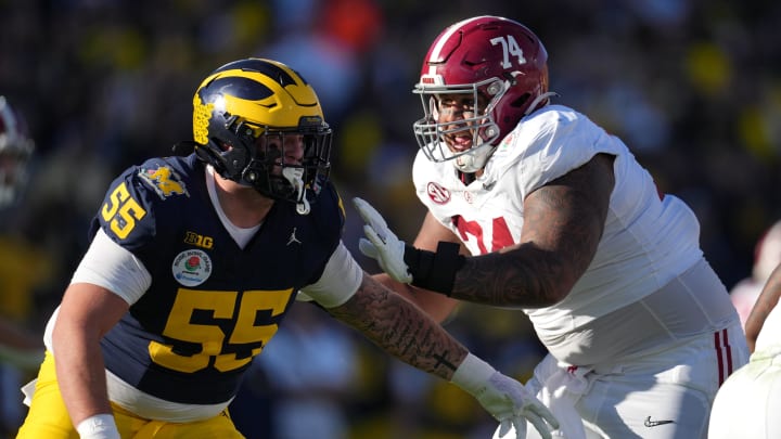 Jan 1, 2024; Pasadena, CA, USA; Alabama Crimson Tide offensive lineman Kadyn Proctor (74) blocks Michigan Wolverines defensive lineman Mason Graham (55) during the first half in the 2024 Rose Bowl college football playoff semifinal game at Rose Bowl. Mandatory Credit: Kirby Lee-USA TODAY Sports