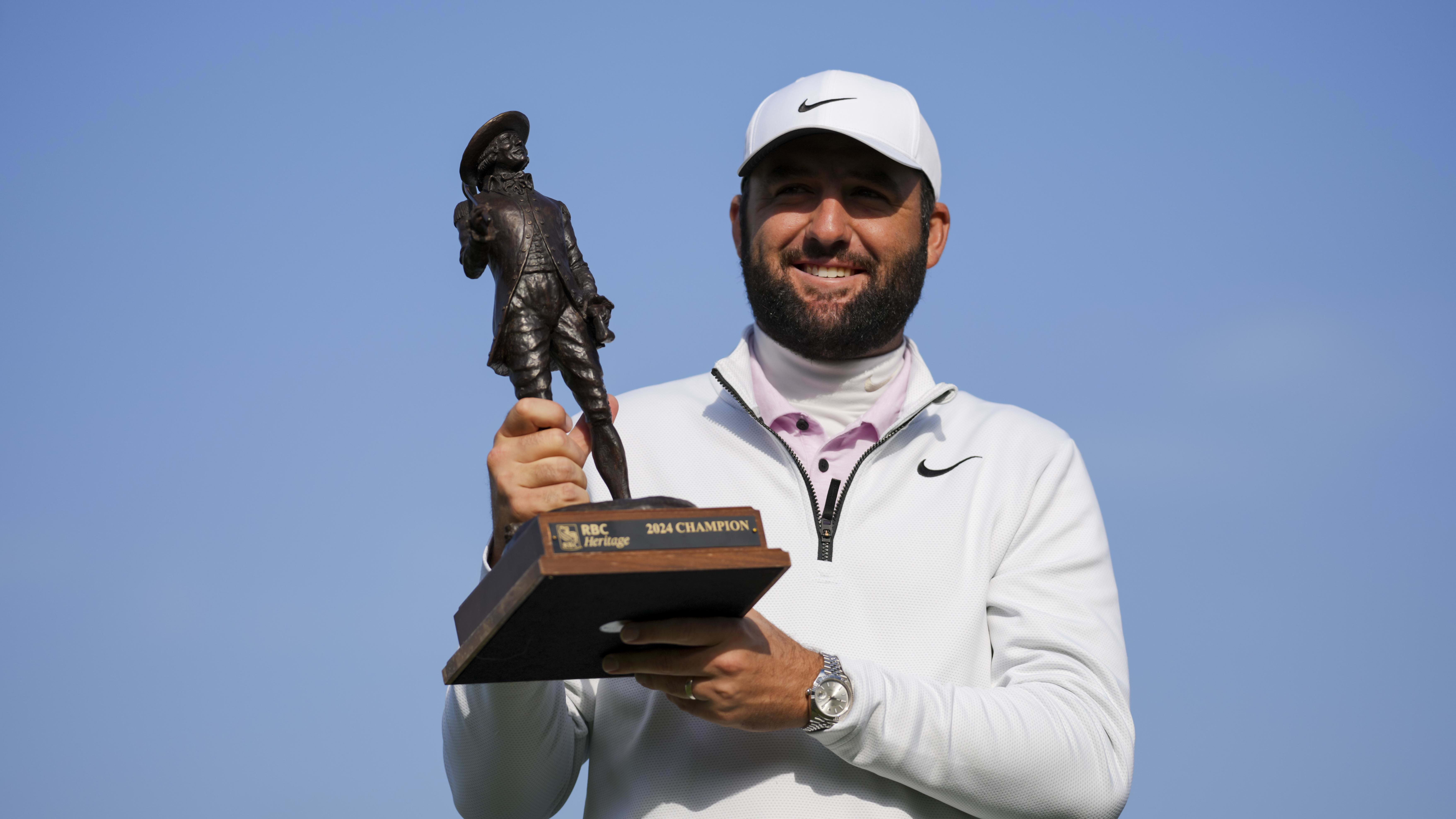 Apr 22, 2024; Hilton Head, South Carolina, USA; Scottie Scheffler holds RBC Heritage trophy.