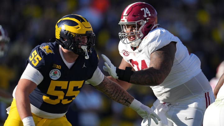 Jan 1, 2024; Pasadena, CA, USA; Alabama Crimson Tide offensive lineman Kadyn Proctor (74) blocks Michigan Wolverines defensive lineman Mason Graham (55) during the first half in the 2024 Rose Bowl college football playoff semifinal game at Rose Bowl. Mandatory Credit: Kirby Lee-USA TODAY Sports