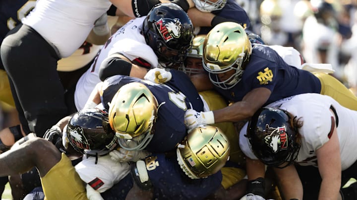 Notre Dame and Northern Illinois get in a dog pile during a NCAA college football game between Notre Dame and Northern Illinois at Notre Dame Stadium on Saturday, Sept. 7, 2024, in South Bend.