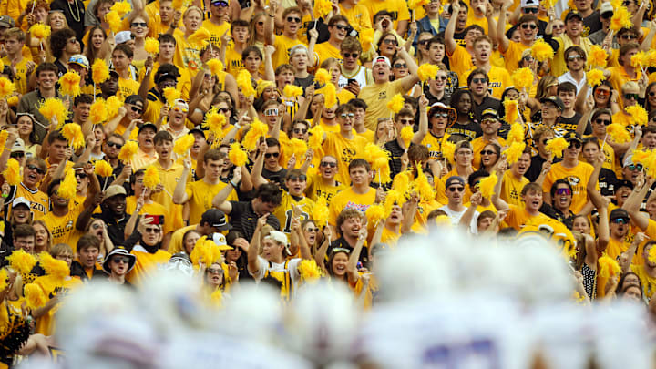 Sep 6, 2025; Columbia, Missouri, USA; Missouri Tigers fans cheer during the first half against the Kansas Jayhawks at Faurot Field at Memorial Stadium. Mandatory Credit: Jay Biggerstaff-Imagn Images
