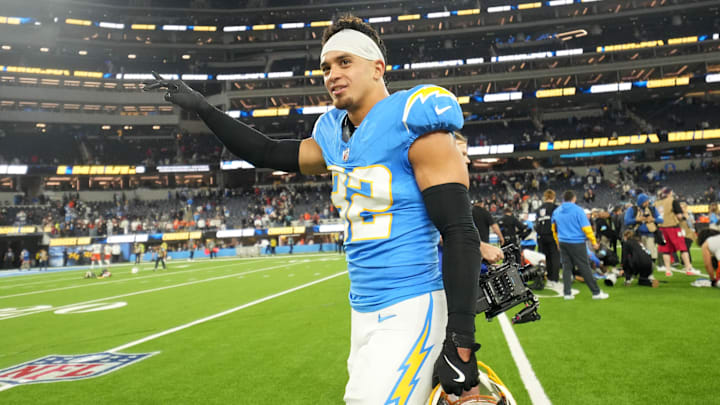 Los Angeles Chargers safety Alohi Gilman (32) celebrates at the end of the game against the Cincinnati Bengals at SoFi Stadium.