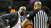 Indiana Hoosiers head coach Mike Woodson questions the referee regarding a call during the first half against the Oregon Ducks at Matthew Knight Arena.