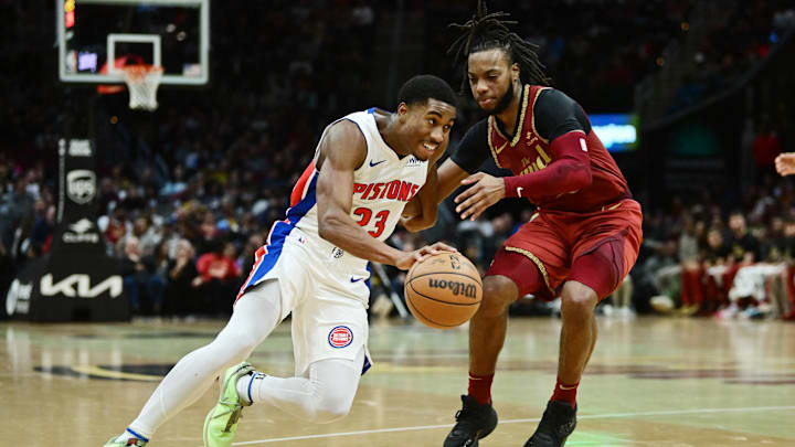 Nov 17, 2023; Cleveland, Ohio, USA; Detroit Pistons guard Jaden Ivey (23) drives to the basket against Cleveland Cavaliers guard Darius Garland (10): Ken Blaze-Imagn Images