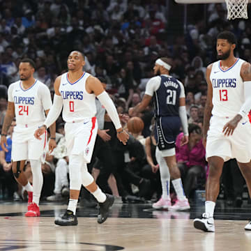 LA Clippers guard Norman Powell (24), guard Russell Westbrook (0) and forward Paul George (13) against the Dallas Mavericks during the 2024 NBA playoffs at Crypto.com Arena. 