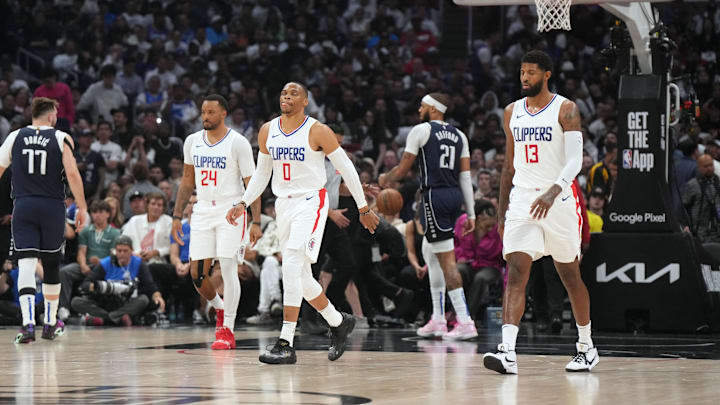 LA Clippers guard Norman Powell (24), guard Russell Westbrook (0) and forward Paul George (13) against the Dallas Mavericks during the 2024 NBA playoffs at Crypto.com Arena. 