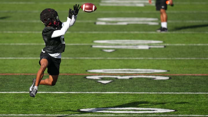 Cincinnati Bearcats defensive back Derrick Canteen catches a pass during spring football practice, Monday, March 4, 2024, at Nippert Stadium in Cincinnati.