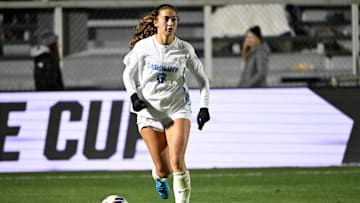 Dec 6, 2024; Cary, NC, USA; North Carolina midfielder Bella Gaetino (8) dribbles in the second half at WakeMed Soccer Park. Mandatory Credit: Bob Donnan-Imagn Images
