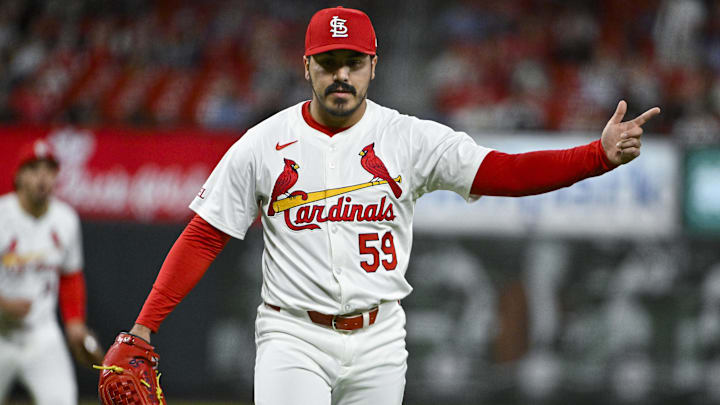 Apr 22, 2024; St. Louis, Missouri, USA;  St. Louis Cardinals relief pitcher JoJo Romero (59) reacts after an inning ending double play against the Arizona Diamondbacks during the eighth inning at Busch Stadium. Mandatory Credit: Jeff Curry-Imagn Images