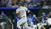 Apr 9, 2025; Kansas City, Missouri, USA; Minnesota Twins first baseman Ty France (13) hits a home run during the ninth inning against the Kansas City Royals at Kauffman Stadium. Mandatory Credit: Jay Biggerstaff-Imagn Images