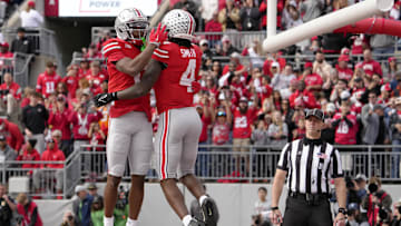 Nov 9, 2024; Columbus, Ohio, USA; Ohio State Buckeyes wide receiver Carnell Tate (17) and Ohio State Buckeyes wide receiver Jeremiah Smith (4) celebrate a touchdown by Smith during the first half at Ohio Stadium. Mandatory Credit: Barbara Perenic/USA TODAY Network via Imagn Images