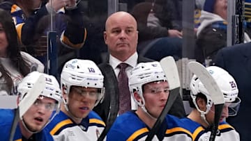 Head coach Jim Montgomery behind the bench