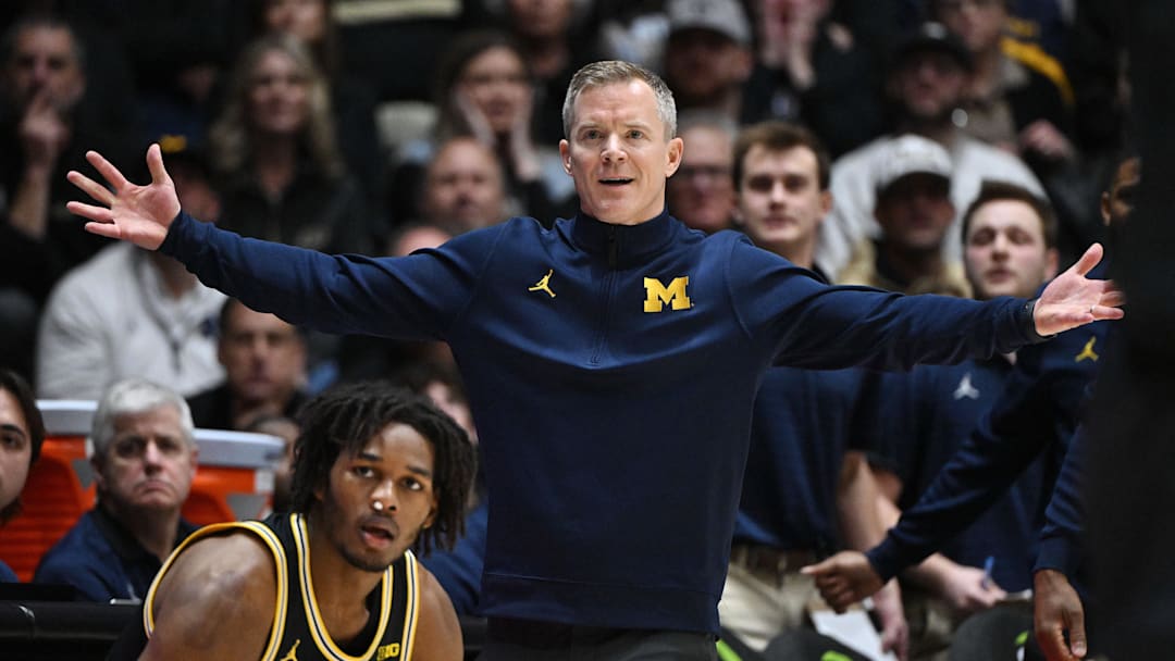 Feb 17, 2026; West Lafayette, Indiana, USA;  Michigan Wolverines head coach Dusty May reacts to a call during the first half against the Purdue Boilermakers at Mackey Arena. Mandatory Credit: Marc Lebryk-Imagn Images