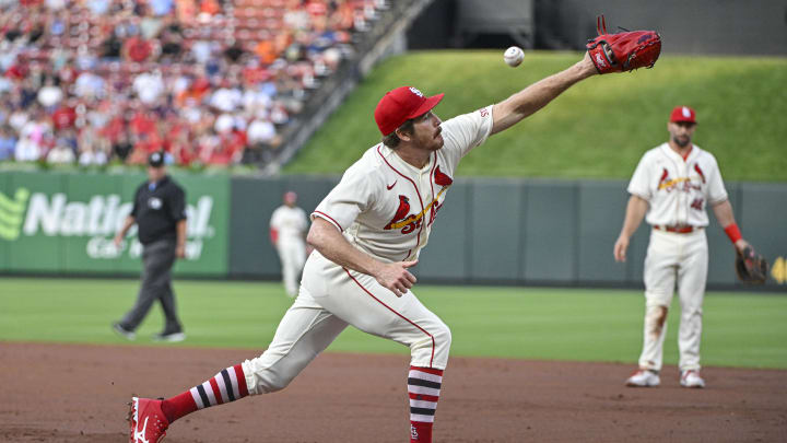 Aug 19, 2023; St. Louis, Missouri, USA;  St. Louis Cardinals starting pitcher Miles Mikolas (39) is unable to catch a throwing error by second baseman Tommy Edman (not pictured) during the third inning against the New York Mets at Busch Stadium. Mandatory Credit: Jeff Curry-USA TODAY Sports