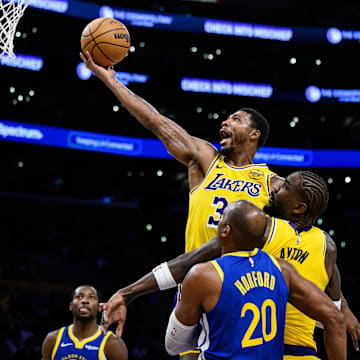 Oct 21, 2025; Los Angeles, California, USA; Los Angeles Lakers guard Marcus Smart (36) shoots during the first half against the Golden State Warriors at Crypto.com Arena. Mandatory Credit: William Liang-Imagn Images