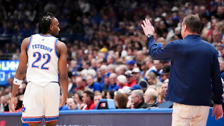 Feb 21, 2026; Lawrence, Kansas, USA; Kansas Jayhawks head coach Bill Self gestures to guard Darryn Peterson (22) against the Cincinnati Bearcats during the second half of the game at Allen Fieldhouse. Feb 21, 2026; Lawrence, Kansas, USA; Kansas Jayhawks head coach Bill Self gestures to guard Darryn Peterson (22) against the Cincinnati Bearcats during the second half of the game at Allen Fieldhouse.