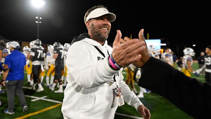 Dec 10, 2022; Mission Viejo, California, USA; St. John Bosco head coach Jason Negro is congratulated after his team defeated Serra Padres45-0 in the CIF State Football Championship Open Division Bowl at Saddleback College. Going into the game St. John Bosco was the #1 ranked high school football team in the USA. Mandatory credit: Robert Hanashiro - USA TODAY.