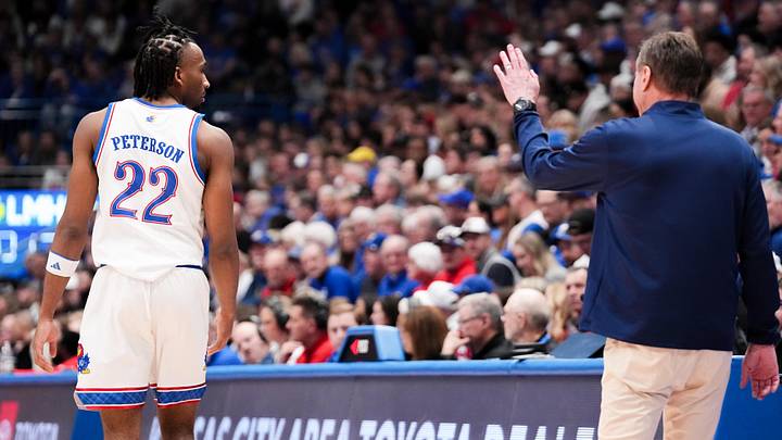 Feb 21, 2026; Lawrence, Kansas, USA; Kansas Jayhawks head coach Bill Self gestures to guard Darryn Peterson (22) against the Cincinnati Bearcats during the second half of the game at Allen Fieldhouse. Mandatory Credit: Denny Medley-Imagn Images