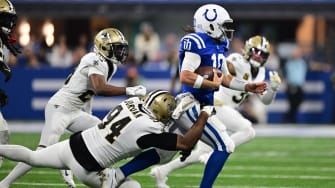 Oct 29, 2023; Indianapolis, Indiana, USA; Indianapolis Colts quarterback Gardner Minshew (10) is sacked by New Orleans Saints defensive end Cameron Jordan (94) during the second quarter at Lucas Oil Stadium. Mandatory Credit: Marc Lebryk-USA TODAY Sports