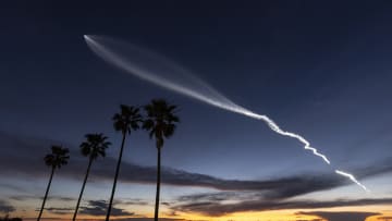 SpaceX Falcon 9 Rocket Launch At Sunset