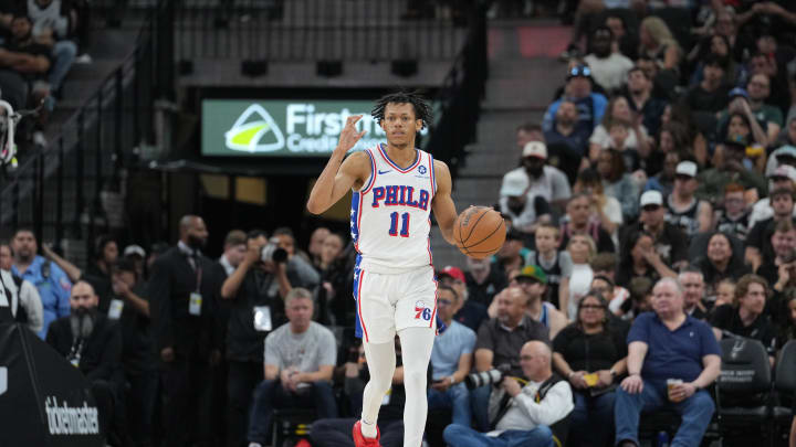 Apr 7, 2024; San Antonio, Texas, USA;  Philadelphia 76ers guard Jeff Dowtin Jr. (11) dribbles in the second half against the San Antonio Spurs at Frost Bank Center. Mandatory Credit: Daniel Dunn-USA TODAY Sports