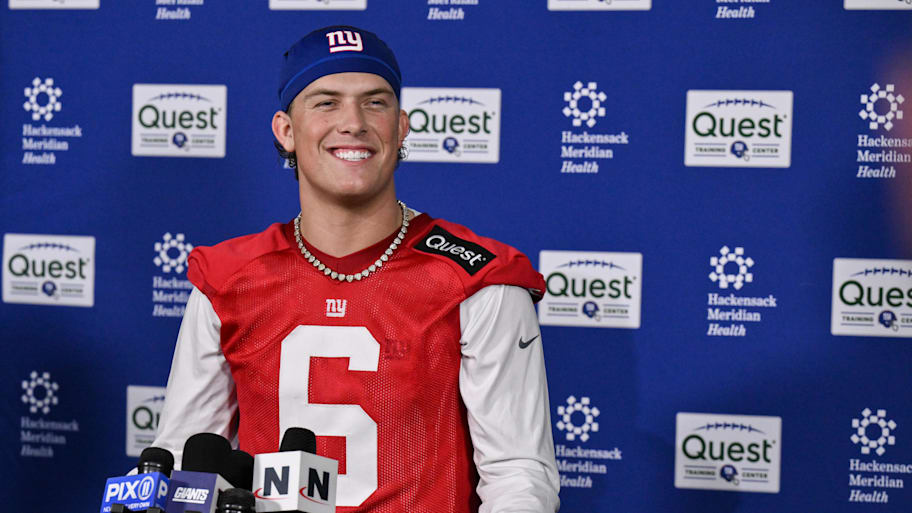 New York Giants quarterback Jaxson Dart speaks to members of the press after rookie minicamp. | John Jones-Imagn Images