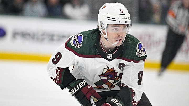 Mar 20, 2024; Dallas, Texas, USA; Arizona Coyotes right wing Clayton Keller (9) skates against the Dallas Stars during the first period at the American Airlines Center. Mandatory Credit: Jerome Miron-Imagn Images