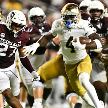 Aug 31, 2024; College Station, Texas, USA; Notre Dame Fighting Irish running back Jeremiyah Love (4) runs the ball for a touchdown in the fourth quarter against the Texas A&M Aggies at Kyle Field. Mandatory Credit: Maria Lysaker-Imagn Images