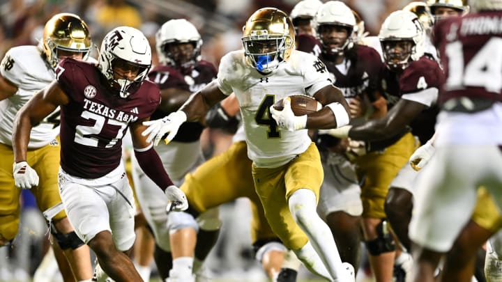 Aug 31, 2024; College Station, Texas, USA; Notre Dame Fighting Irish running back Jeremiyah Love (4) runs the ball for a touchdown in the fourth quarter against the Texas A&M Aggies at Kyle Field.