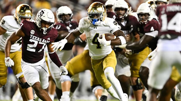 Jeremiyah Love runs for a touchdown for Notre Dame at Texas A&M in 2024.