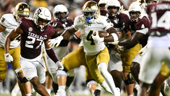 Aug 31, 2024; College Station, Texas, USA; Notre Dame Fighting Irish running back Jeremiyah Love (4) runs the ball for a touchdown in the fourth quarter against the Texas A&M Aggies at Kyle Field.