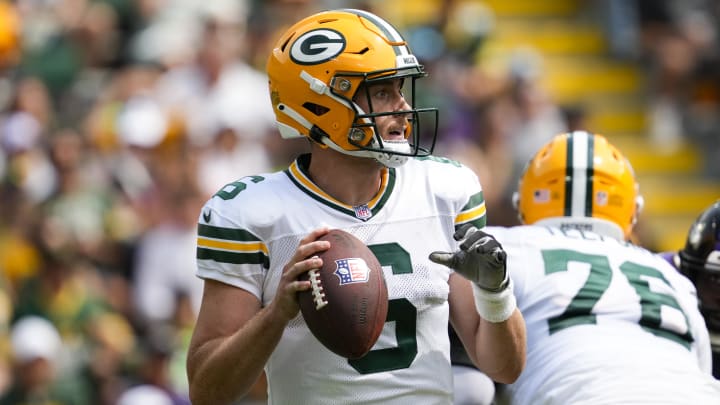 Green Bay Packers quarterback Sean Clifford (6) looks to throw a pass during the second quarter against the Baltimore Ravens on Saturday.